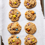 Stack of chewy, colorful rainbow chip cookies – made from Meli’s gluten-free mix